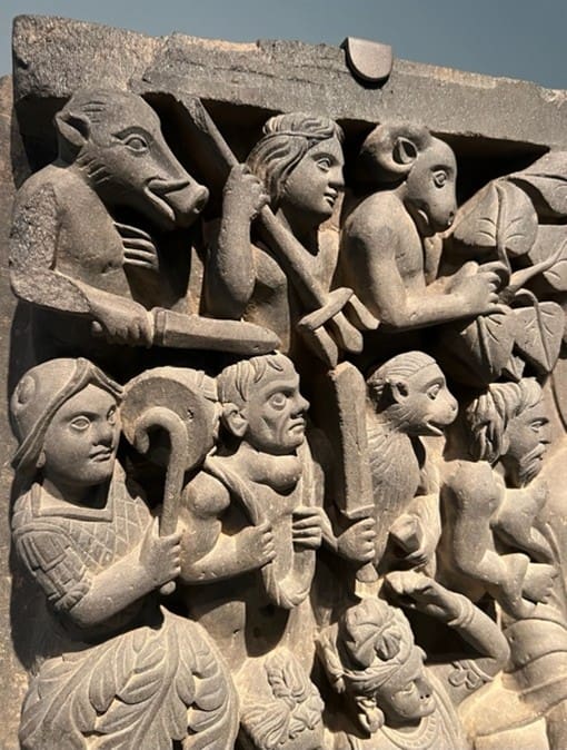 Closeup of onlookers witnessing the Buddha displaying the bhumisparsha mudra. Photograph by Ashley Crawford