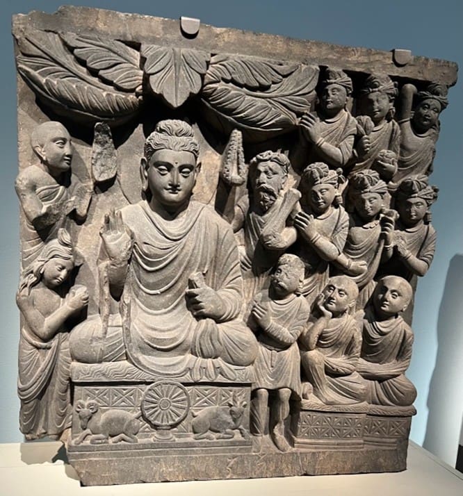 Gandharan frieze of the Buddha’s first sermon. Photograph by Ashley Crawford