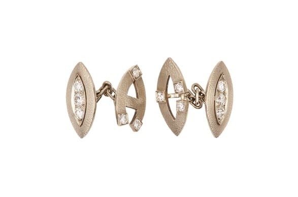 A pair of 14k white gold and diamond personalised cufflinks, owned by Al Capone. Sold at Witherills Auctioneers, 2021, for $33,275
