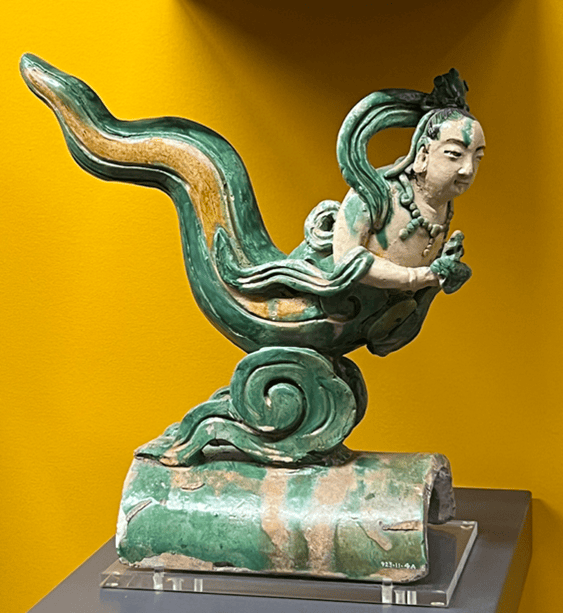 A sancai earthenware rooftile, 17th-18th century, in the shape of a mermaid at the ROM, dimensions unknown. Photograph by Ashley Innes.
