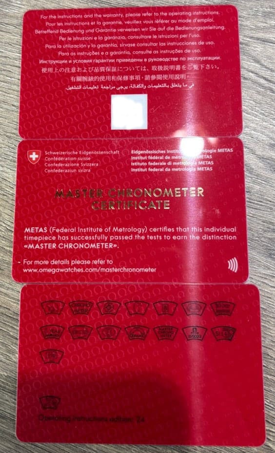 Omega Watch - Warranty Card, Master Chronometer and Pictograms cards.